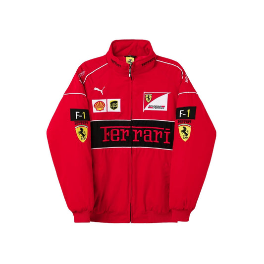 Michael Schumacher Retro Ferrari Bomber Jacket with an embroidered chest crest and ribbed collar, shown in classic red and black styling. Retro race day attire for car meets, circuits and fan nights.