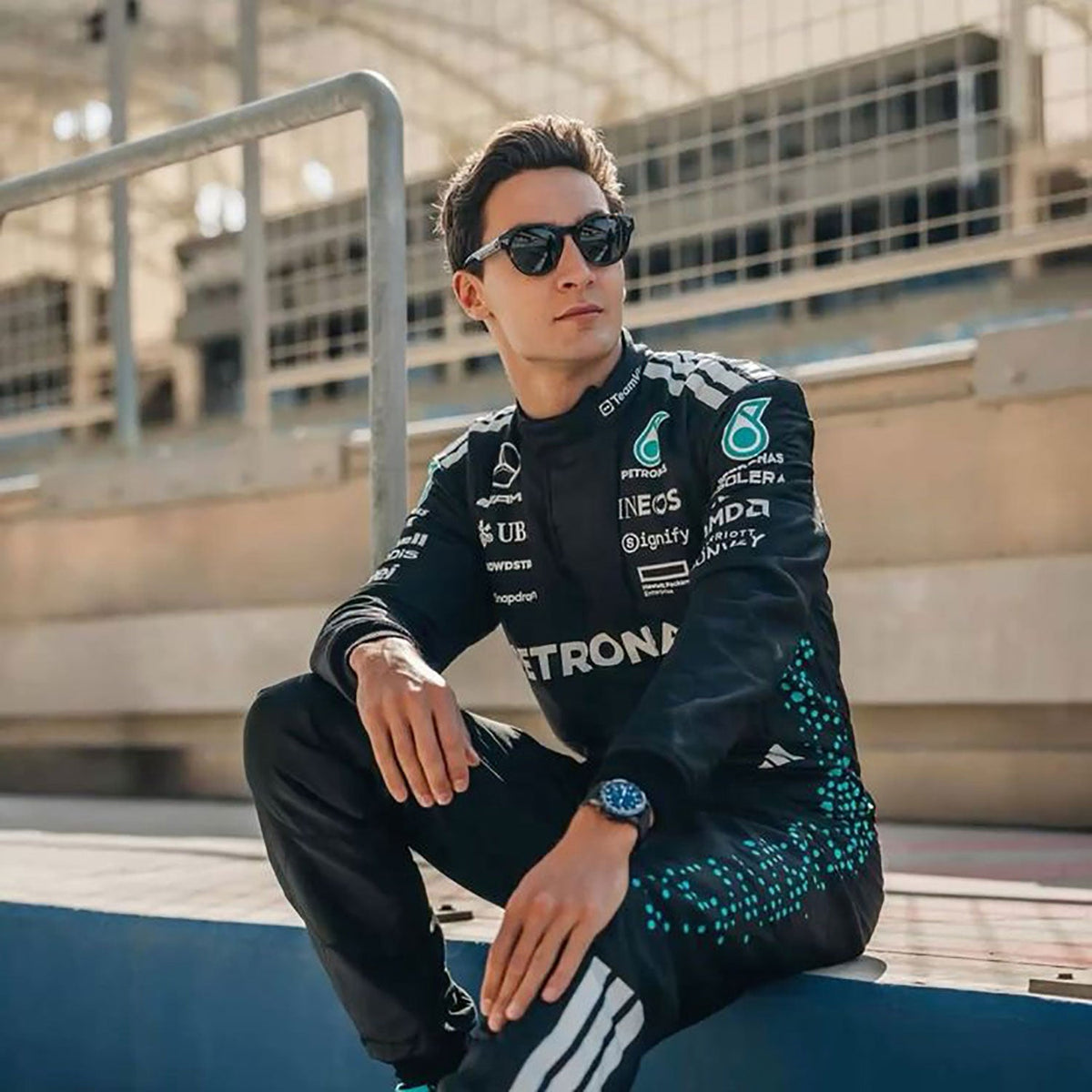 George Russell inspired motorsport jumpsuit, featuring layered stripes, driver name styling and contrast panels. Perfect grand prix attire for fans who want a race-ready look at the circuit or at home.