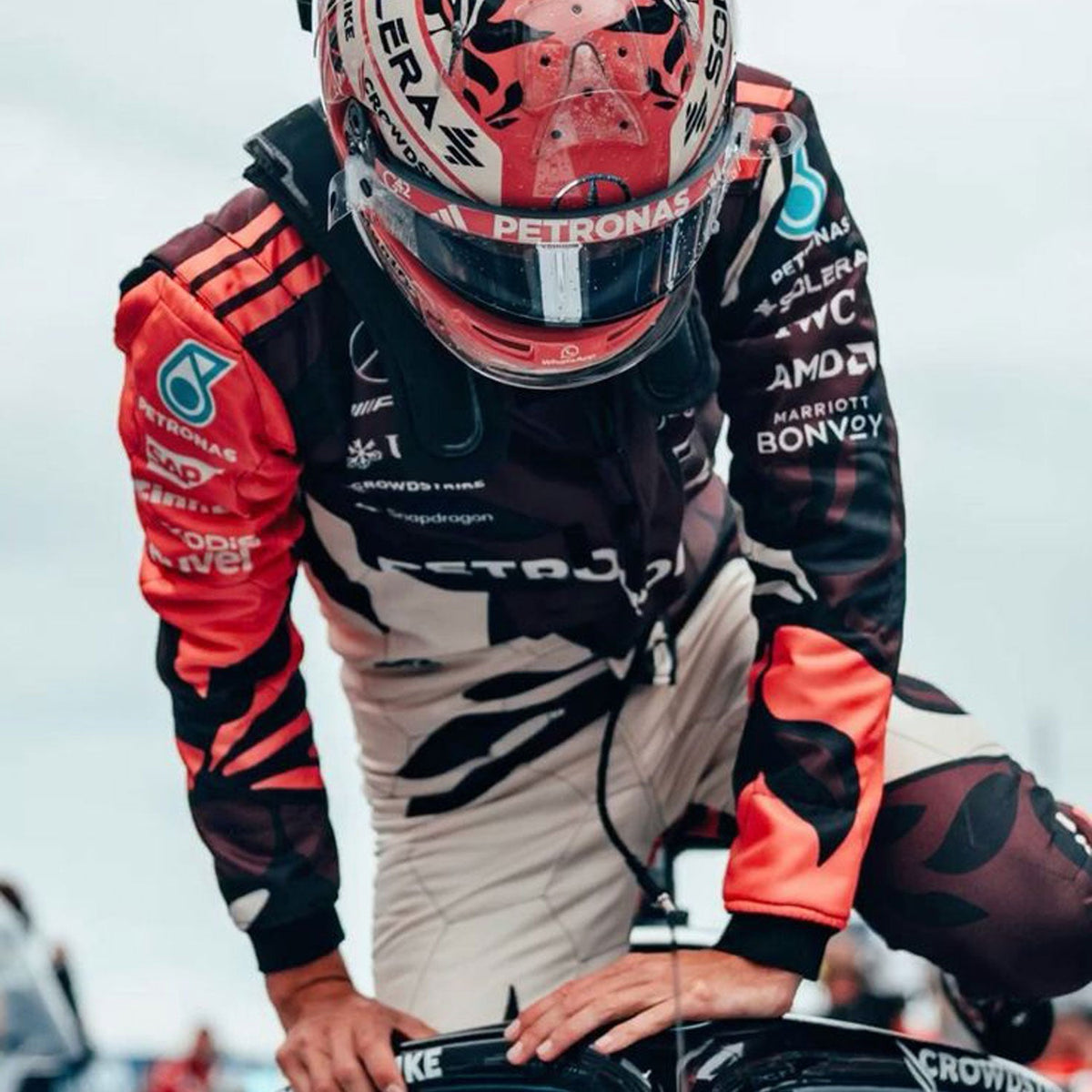 Printed Mercedes 2025 racing outfit for George Russell fans, presented with detailed logo placement along the arms and legs. Stylish racing attire for fans who want to dress like the grid on grand prix weekend.