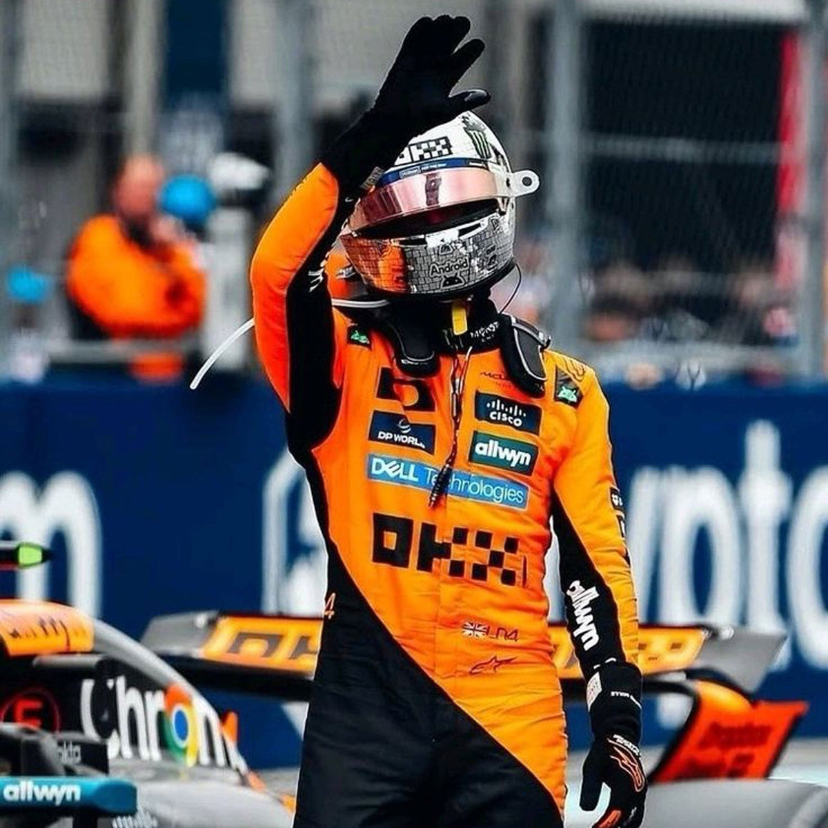 Lando Norris inspired motorsport jumpsuit, displaying the fitted one-piece cut with elasticated cuffs and a soft collar. A great F1 cosplay outfit for fans heading to a grand prix, a karting session or a themed party.
