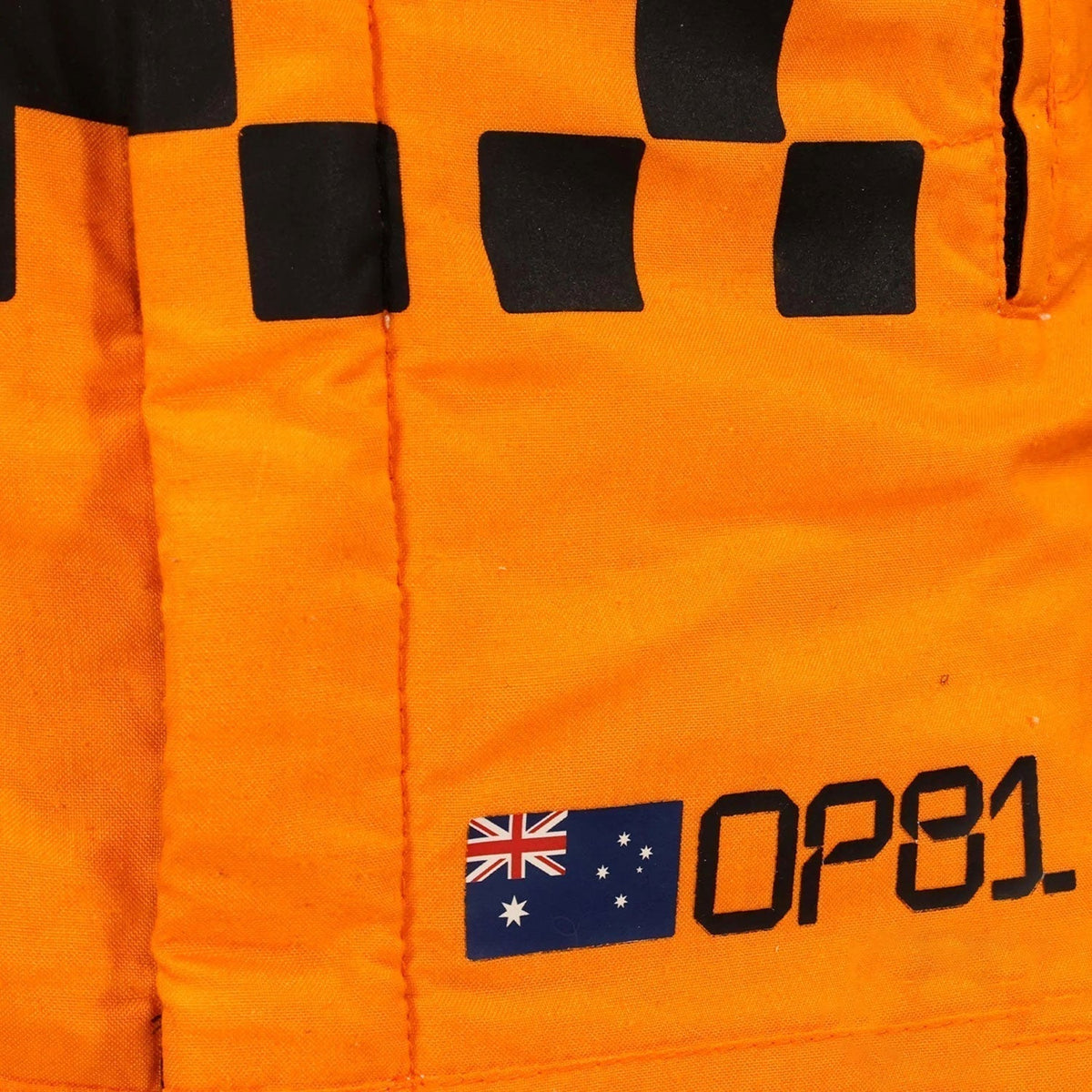 Oscar Piastri 2025 season grand prix suit, highlighting bold colour blocking and crisp sublimated artwork. A bold motorsport jumpsuit that makes a great cosplay outfit on grand prix weekend.